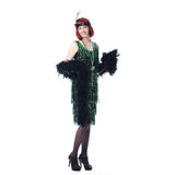 Dark Green Sequin Flapper - Hire, green sequin fringing over black dress, knee length. Hire includes dress, boa, gloves, beads and headdress.