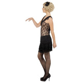 All That Jazz Flapper black and nude dress, lace bodice with nude lining, black fringed short skirt, sleeveless with fringing around neckline.