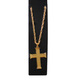 Big Cross Necklace gold cross has a dimpled look.