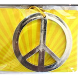 Peace symbol necklace, silver plastic on gold cord.