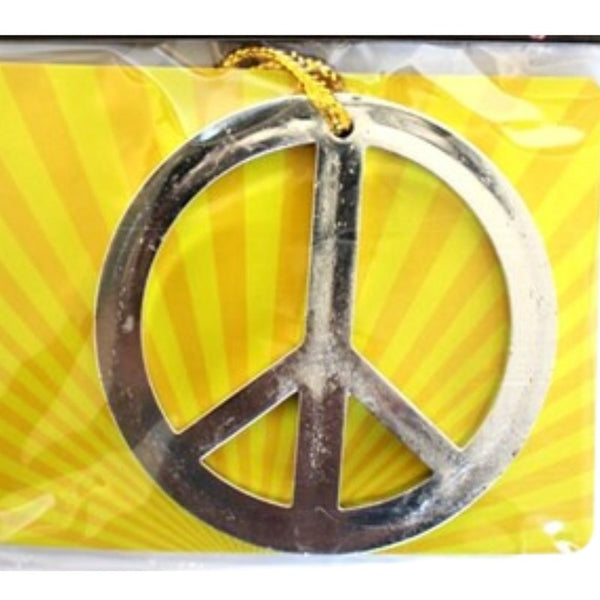 Peace symbol necklace, silver plastic on gold cord.