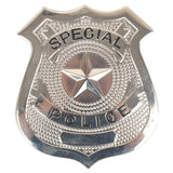 Metal police badge with brooch back and "special police" on badge.