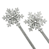 silver snowflake wand with tow snowfakes jointed together.